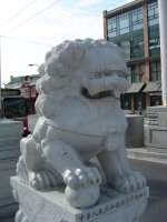 A Lion Guards Chinatown Gate